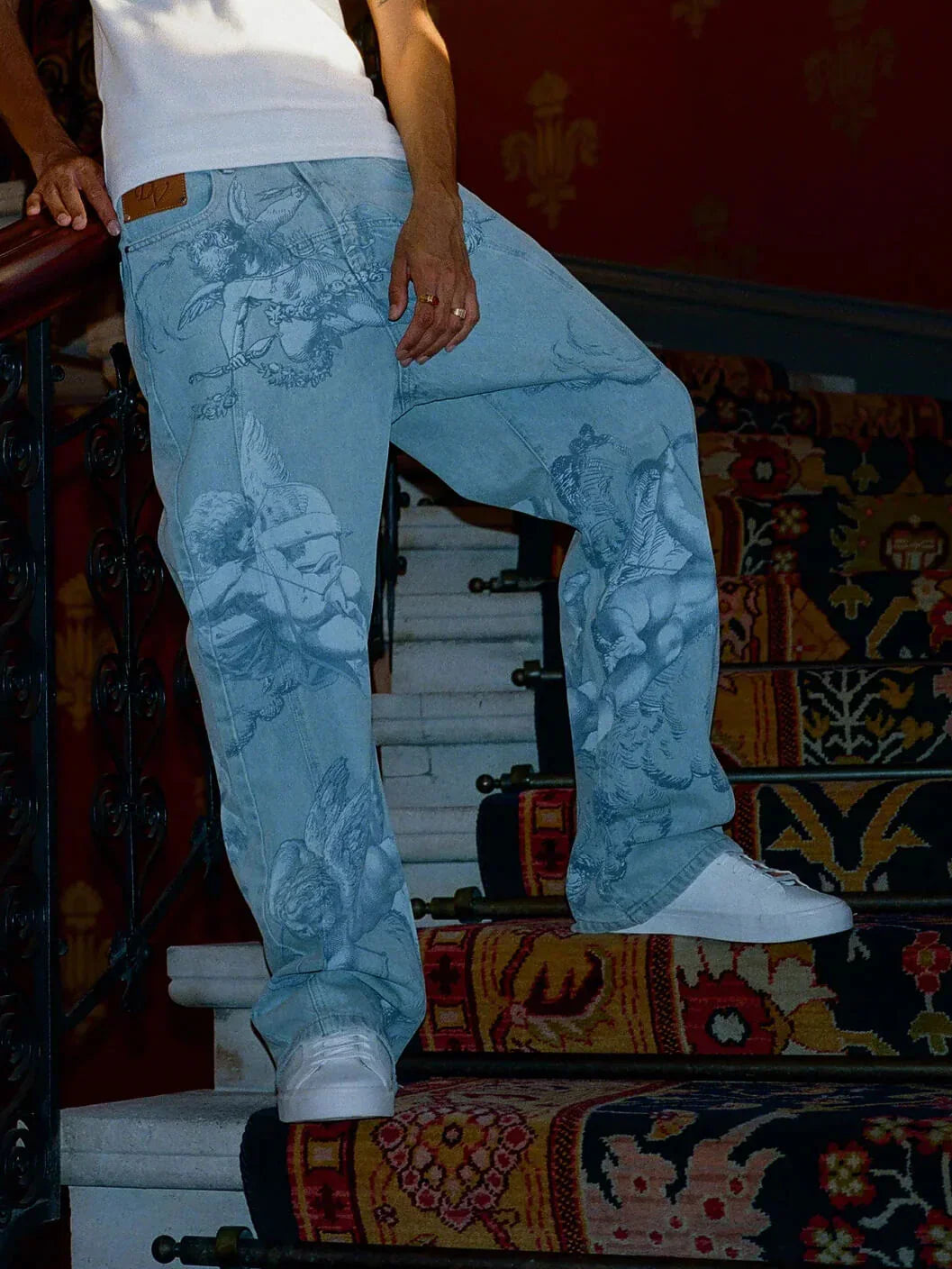 Washed Jeans With Cupid Print